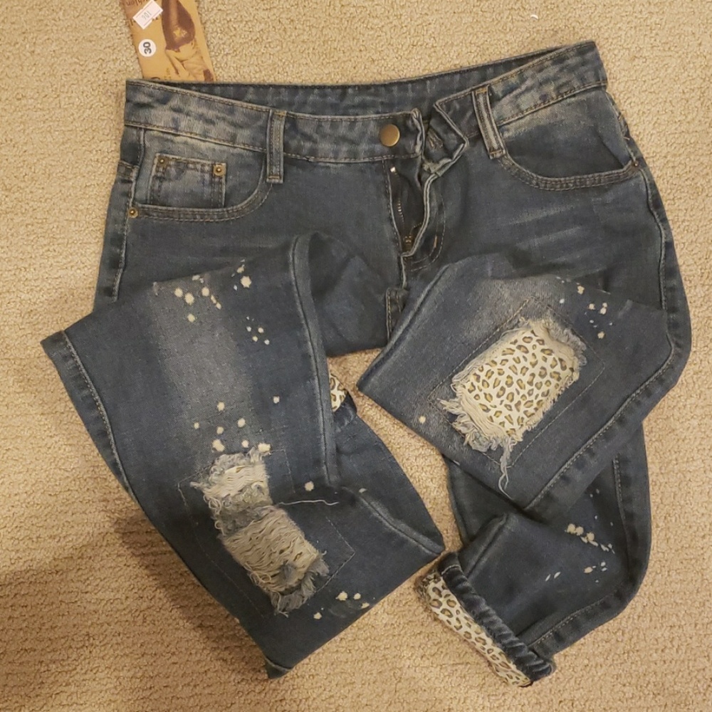 Kumel distressed leopard insert jeans
